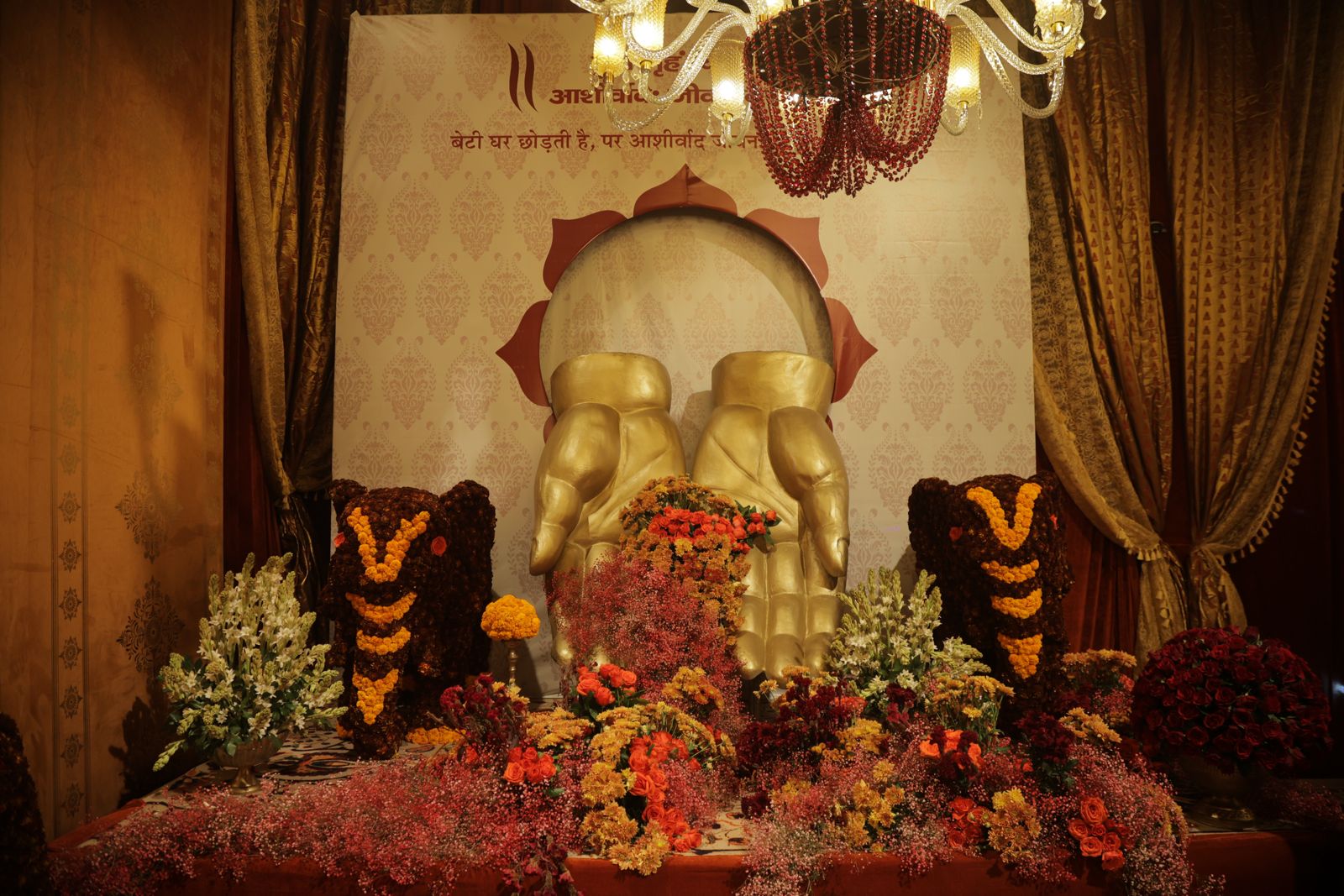 A floral blessing in marigold and rose