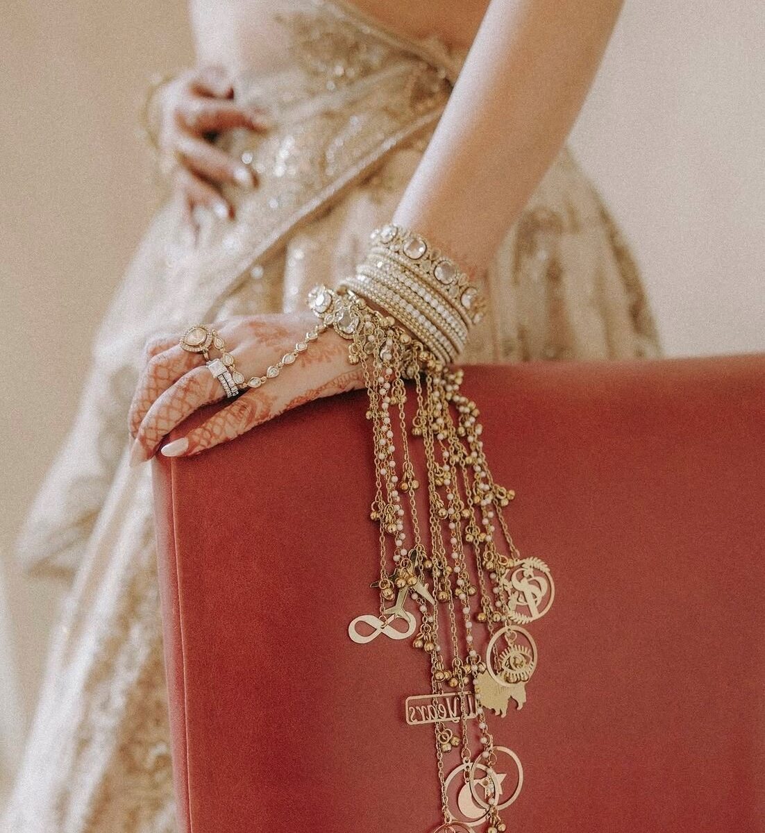 Close detail of the styling — laid tables, stationery, vow books and jewellery